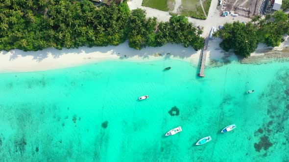 Aerial abstract of beautiful coast beach journey by aqua blue ocean with white sandy background of a