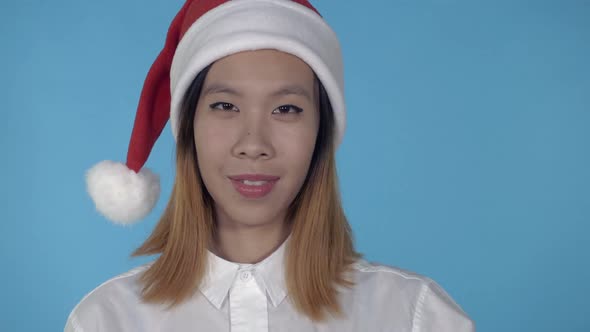 Beautiful Korean Girl Christmas Showing Gesture Ok