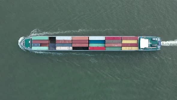 Bird's Eye View of a Cargo Shipping Container Ship at Sea