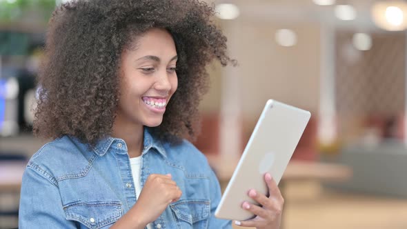 African Woman Doing Video Call on Tablet 