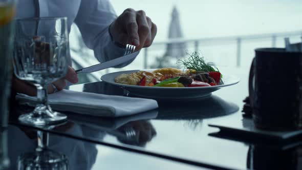 Man Hands Using Served Cutlery Eating Dinner Meal in Stylish Restaurant Closeup