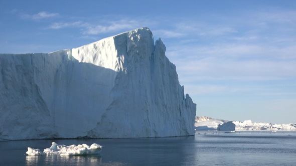 Icebergs and global warming. Greenland Melting Water. Arctic Ice Nature Landscape of Climate Change.