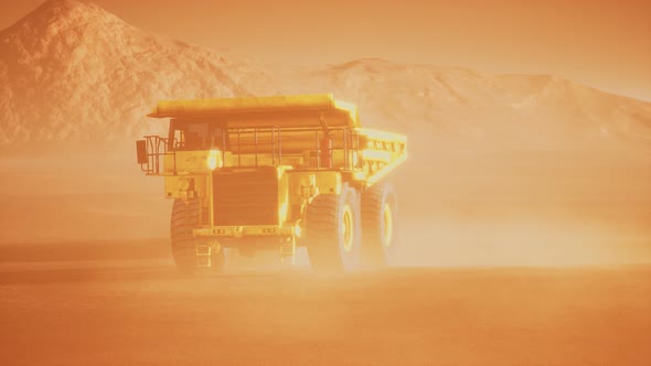 Big Yellow Mining Truck in the Dust at Career