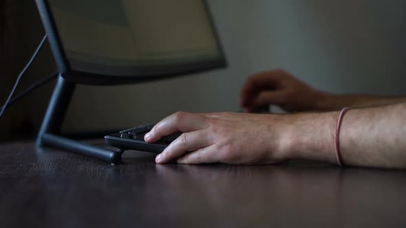 Senior Man is Typing on Keyboard of Computer Businessman is Using Digital Device Sitting at the