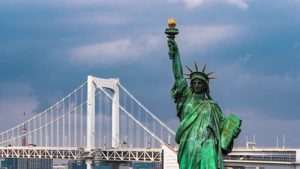 time lapse of unidentified tourist visited the Statue of Liberty and Rainbow bridge at Odaiba