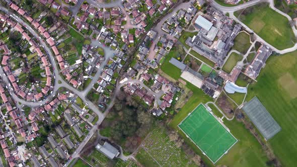Straight down aerial drone footage of a Schools football pitches and playing fields