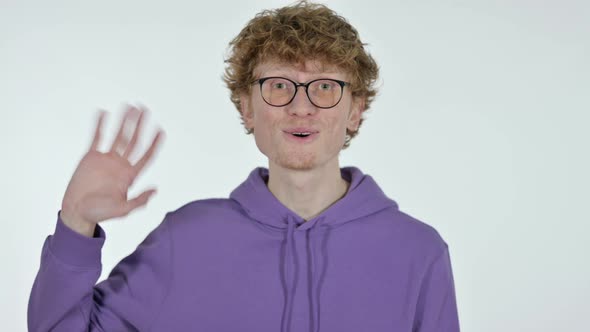 Welcoming Redhead Young Man Waving, White Background