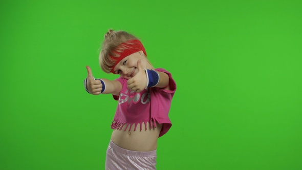 Happy Girl in Pink Sportswear Showing Thumb Up Gesture Isolated on Chroma Key Background, Fitness