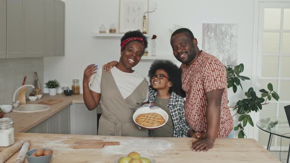 Portrait of African American Family with Homemade Apple Pie