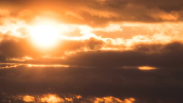 Dramatic Sunset Over the Storm Clouds. Time Lapse