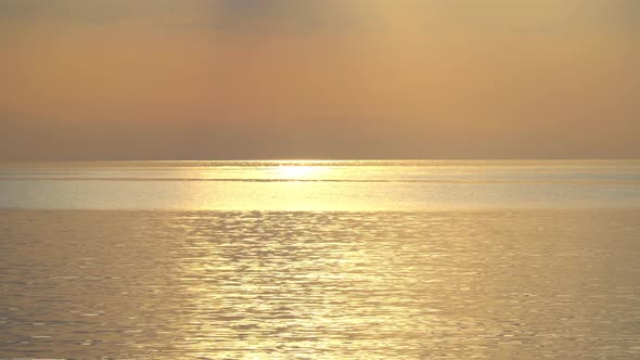 Solar Glare On The Sea At Sunrise