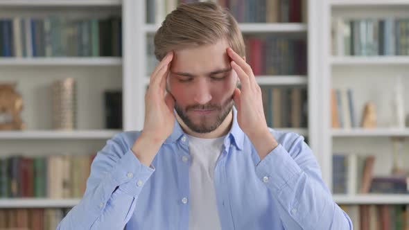 Portrait of Man Having Headache