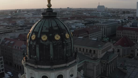 AERIAL: Close Up Drone View of Cathedral Tower Roof in Berlin, Germany at Sunset