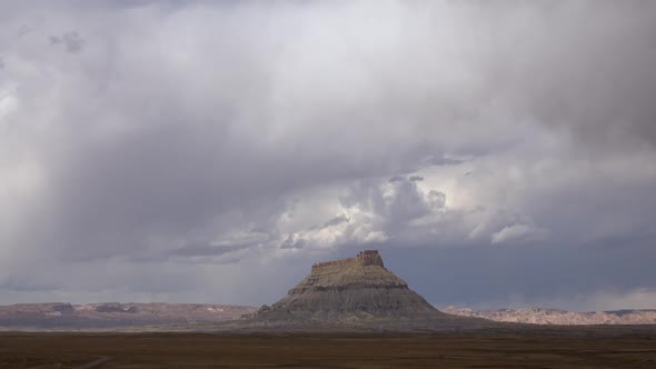 Time lapse of desert storm moving past Factory Butte