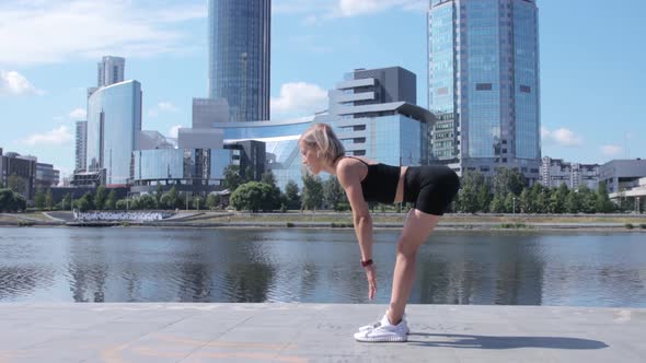 Woman working out in city