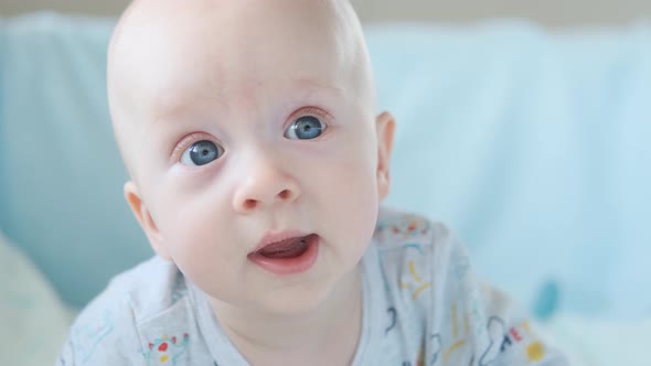 close-up portrait of blue eyed baby boy