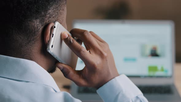 Backside Unknown African American Man Young Businessman Web Designer Look at Laptop Screen Surf