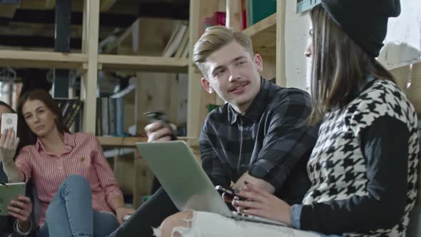 Hipster Business Team Resting in Office