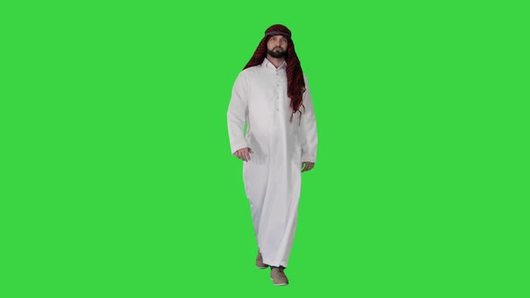 Serious Sheikh Having a Walk on a Green Screen, Chroma Key.