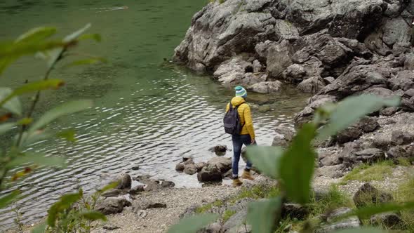 Hikers at Fusine lake, Italy