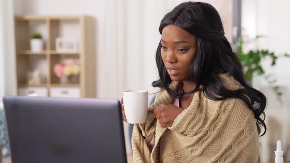 Sick Woman with Tea Having Video Call on Laptop