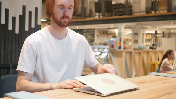 Redhead Beard Man Coming to Cafe and Working on Laptop