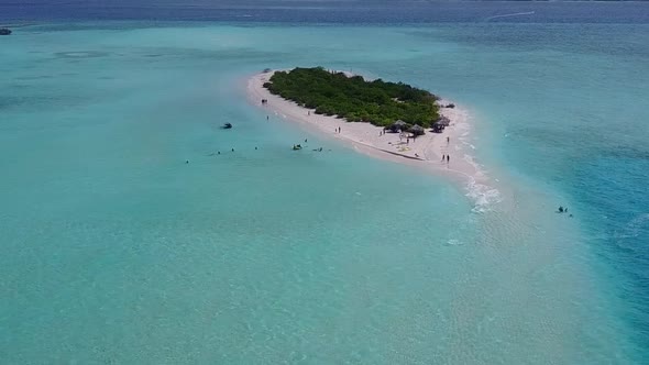 Aerial drone panorama of tropical coast beach by lagoon with sand background