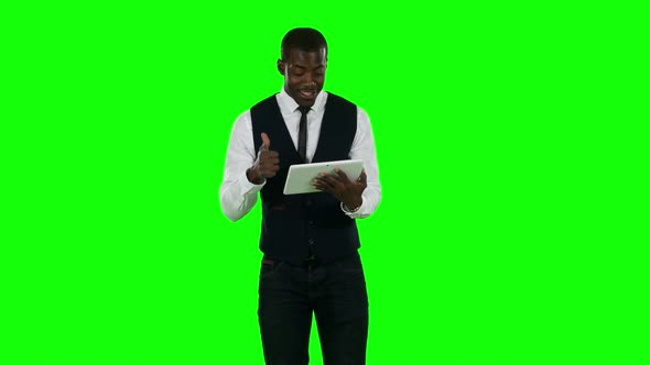 Business Man Makes Online Shopping . Green Screen.