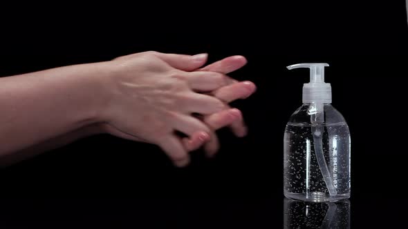 Woman Using A Gel Rubbing An Alternative With Hand Washing