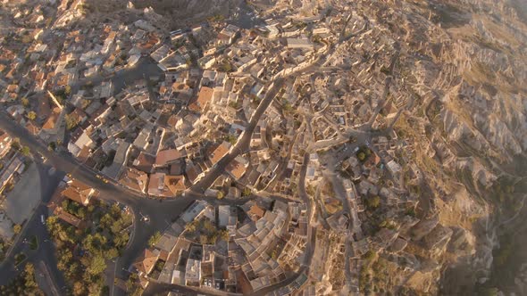 Cappadocia Aerial Shot of Rock Chimneys and Uchisar Castle in Goreme Turkey