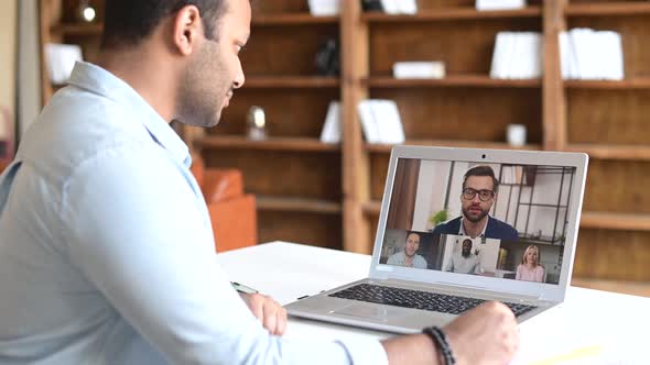 Indian Man Using Computer Application for Distance Video Communication