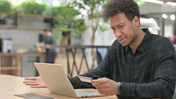 Online Payment Failure on Laptop By African American Man