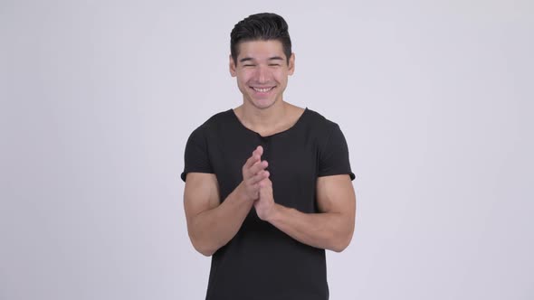 Young Happy Multi-ethnic Man Clapping Hands