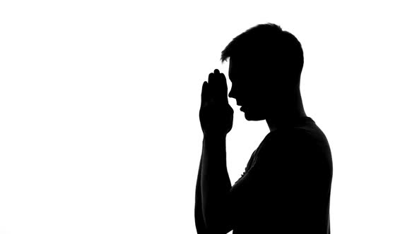 Male Silhouette Praying, Asking God Forgiveness, Spiritual Ritual, Thanksgiving