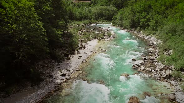 Aerial view of the rocks in water at the Soca river in Slovenia, Europe.
