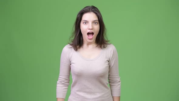 Young Beautiful Woman Looking Shocked