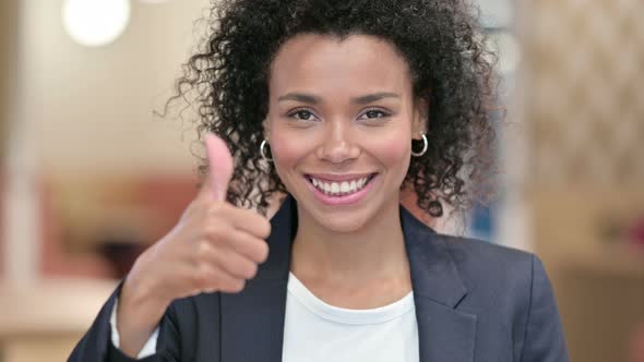 Positive African Businesswoman Doing Thumbs Up 