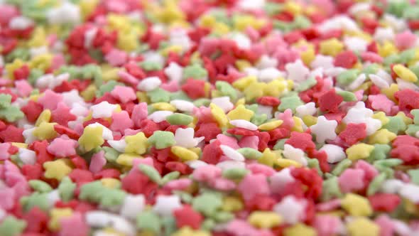 Multicolored star sugar sprinkles. Colorful sweet baking decorations