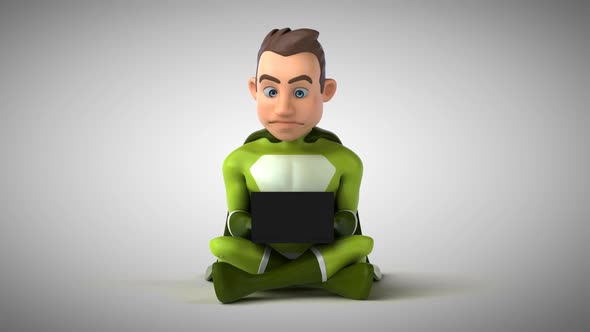 Fun 3D cartoon superhero typing on a laptop