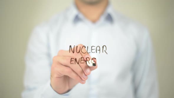 Nuclear Energy, Businessman Writing on Transparent Screen