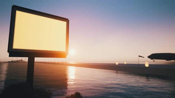 The Sunset Time with the Plane Takes Off and the Board of Your Ad alt