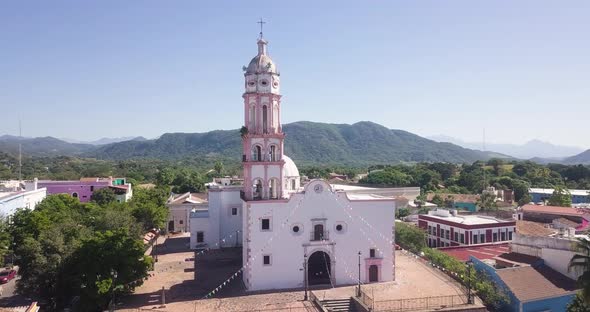 Picturesque view of historic church and sunny rural landscape. Cosala, Mexico