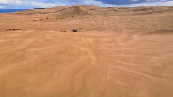 Aerial footage of Giant sand dunes in New Zealand