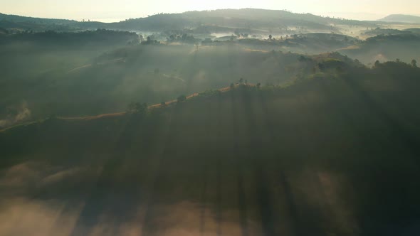 4K Drone Flying through the clouds at dusk or dawn. Aerial top cloudscape