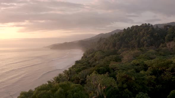 Jungle meets the ocean at Punta Uvita Beach in western Costa Rica Central America during sunset, Aer