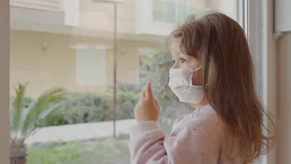 Quarantined Girl Is Looking Through The Window