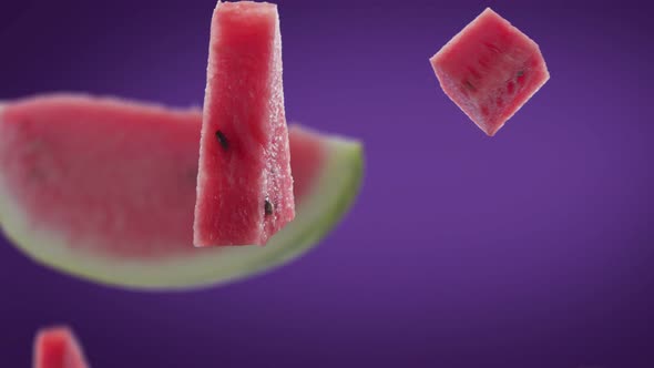Flying of Watermelon and Slices in Purple Background