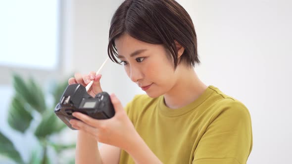 Woman grooming the camera