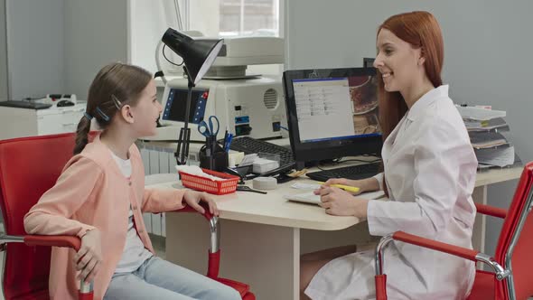 Girl Visiting Eye Doctor