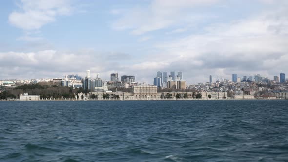 Dolmabahce Palace in Istanbul City View From Sailing Ship Along Bosphorus Strait
